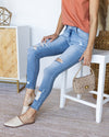 Mary Mid-Rise Distressed Skinny Jeans - Light Wash